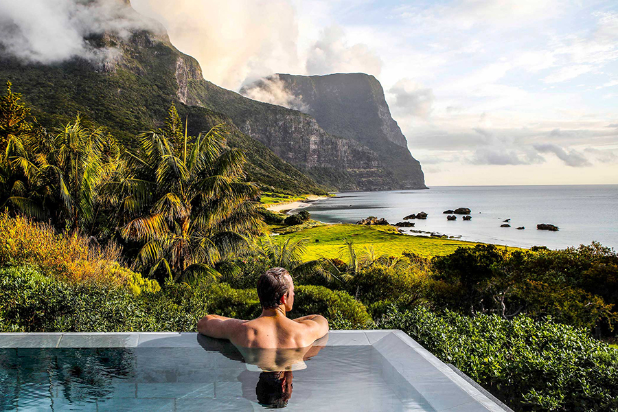 Enjoy golden sunsets and calm evenings with ocean and mountain views from the pool at Capella Lodge | Photo credit: Capella Lodge