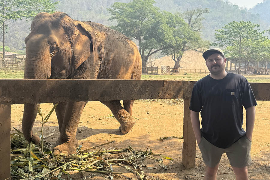 Ben at an elephant sanctuary in Chiang Mai, Thailand | Travel Nation 