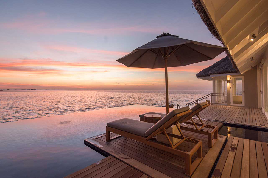 Watch the sky transform from the serenity of your private infinity pool at LUX South Ari Atol | Photo credit: LUX