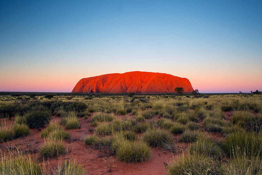Watch the ever-changing colours of Uluru at sunset | Sydney to Uluru