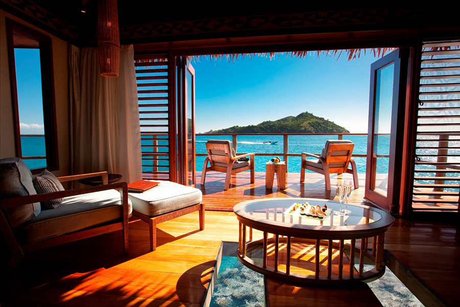 Soak up the spectacular views from your overwater bungalow | Photo credit: Likuliku Island Resort