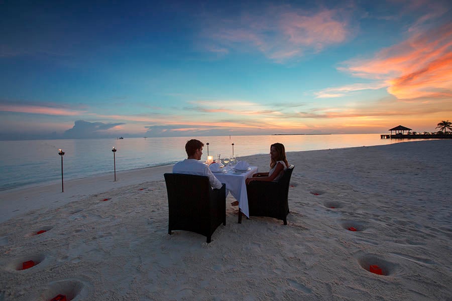 Enjoy a private candlelit dinner on the beach| photo credit: Velassuru Maldives
