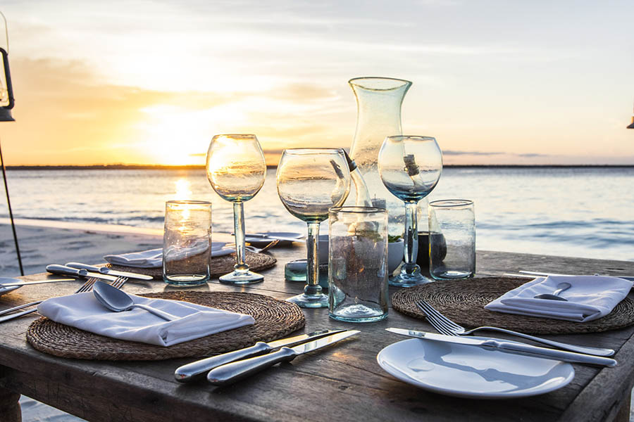 Tuck into an indulgent dinner on Mnemba Island | Travel Nation