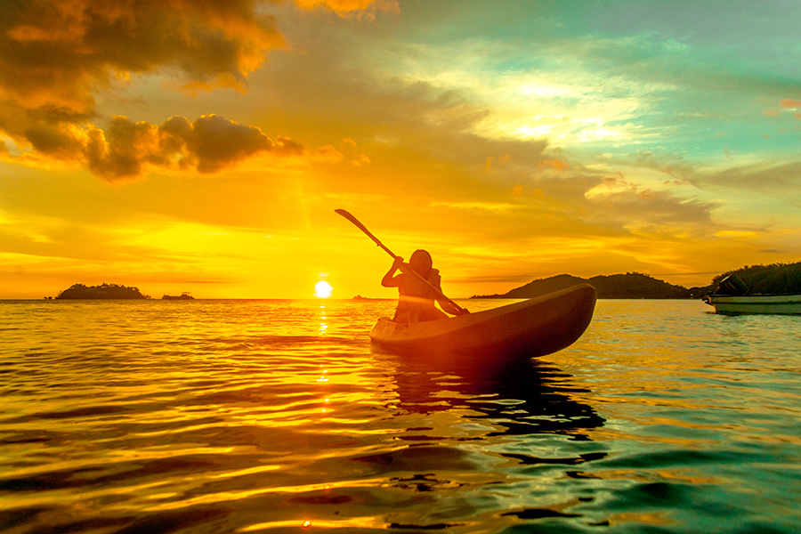 Kayak along the shore as the sun sets at Tropica | Photo credit: Tropica Island Resort