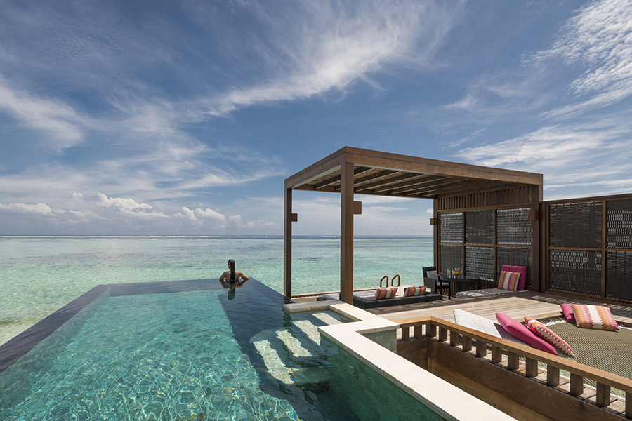 Watch the sunset from your private pool at Kuda Huraa in the Maldives | Photo credit: Four Seasons