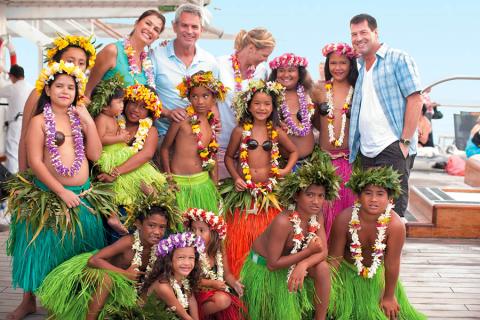 See traditional French Polynesian dancers aboard a Paul Gauguin cruise | Photo credit: Paul Gauguin Cruises