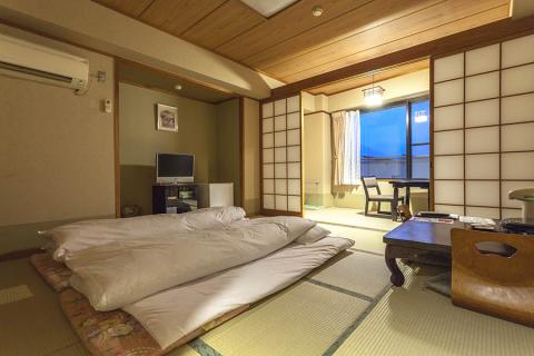 You should definitely arrange to stay at a traditional inn or ‘ryokan’