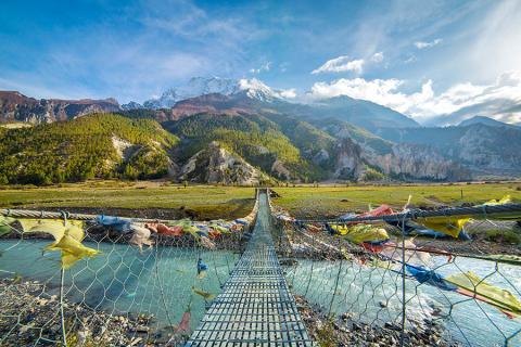 Cross hanging bridges as you trek in Nepal | Travel Nation
