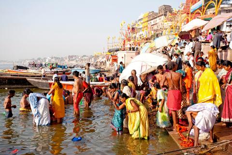 People bathing in the River Ganges, Varanasi, India