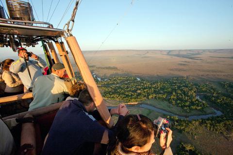 Float above the Masai Mara in a hot air balloon