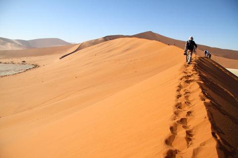 Climb the beautiful red dunes of Sossuvlei