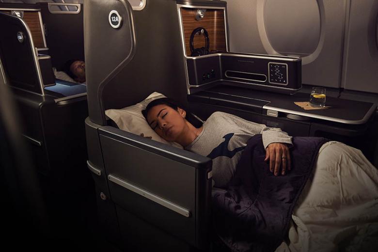 Lie back in the Qantas Business suite | Photo credit: Qantas