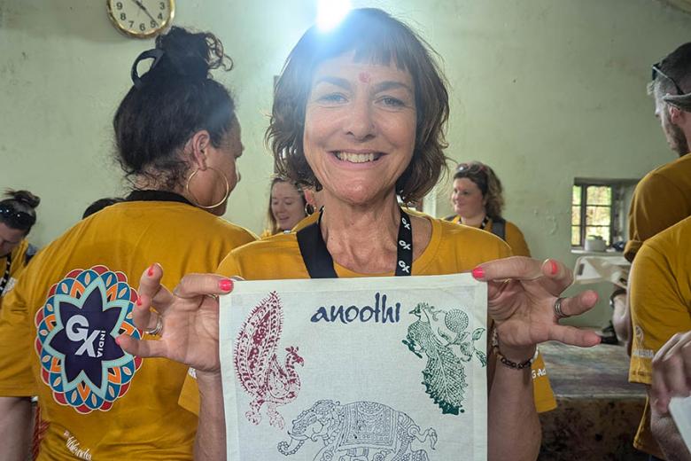 Liz with her artwork in India | Travel Nation