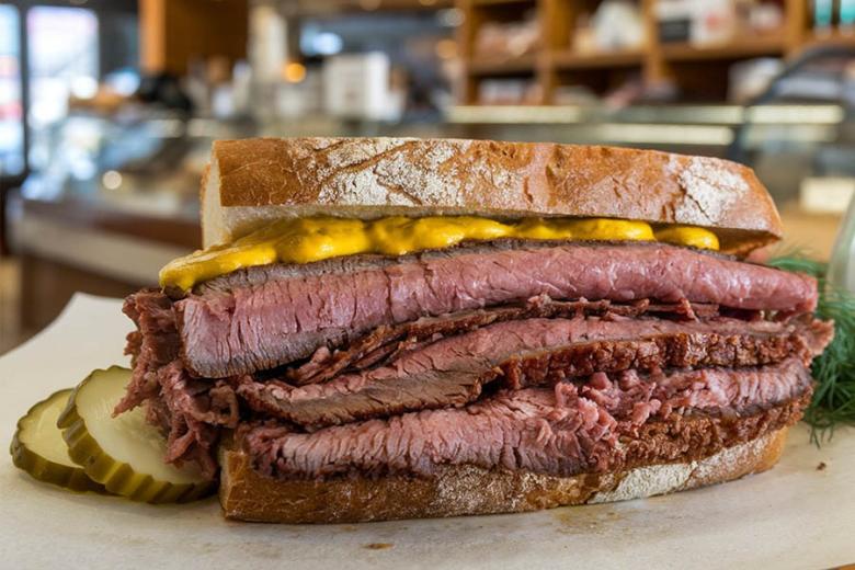 Try a smoked meat sandwich in Montreal | Travel Nation