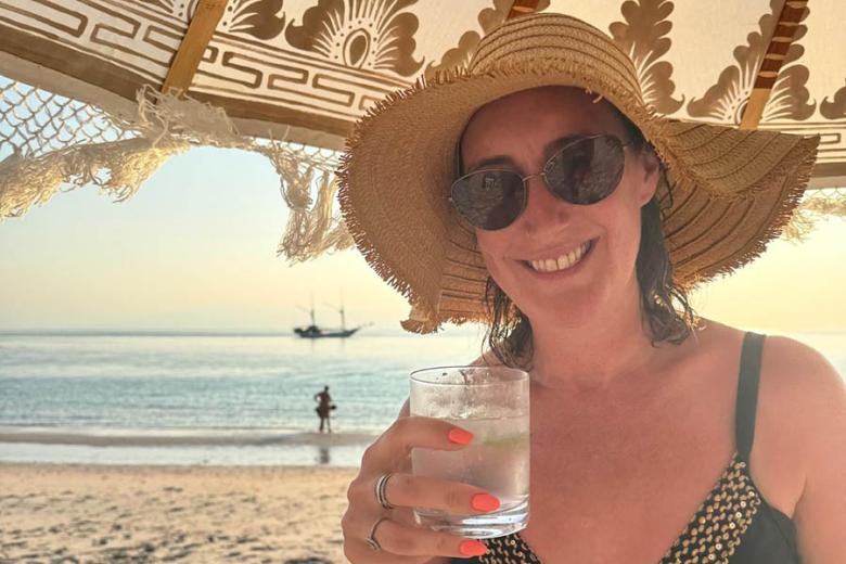 Nikki on Pink Beach in Indonesia | Travel Nation