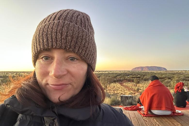 Marie at Uluru at sunrise | Travel Nation