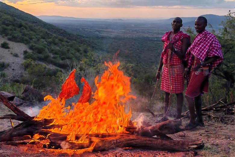 Sunset around the fire in the Maasai Mara | Travel Nation