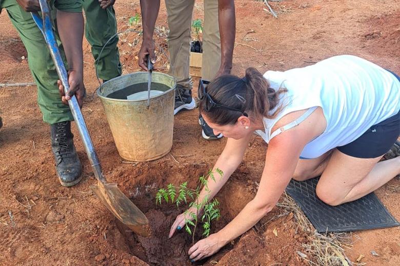 Natalie planting trees in Kenya | Travel Nation
