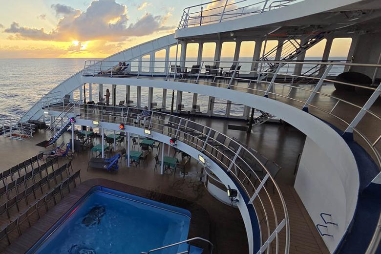 Sunset on the pool deck of the Aranui 5 | Travel Nation