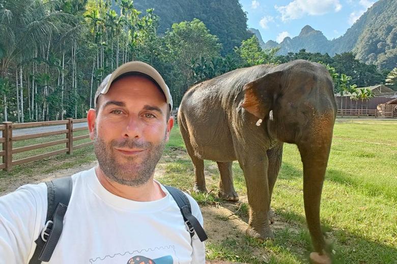 Audric at an elephant sanctuary in Thailand | Travel Nation