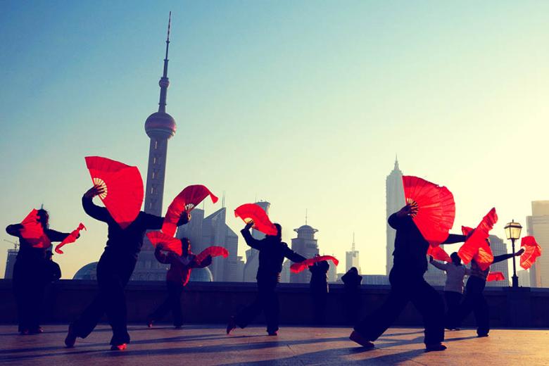Watch traditional fan dancing on the streets of Shanghai | Travel Nation