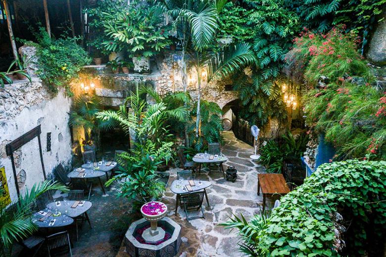 Eat in the Secret Garden Restaurant | Photo credit: Emerson Hotels