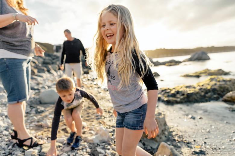 Famille sur la plage | credit: Mark Clinton