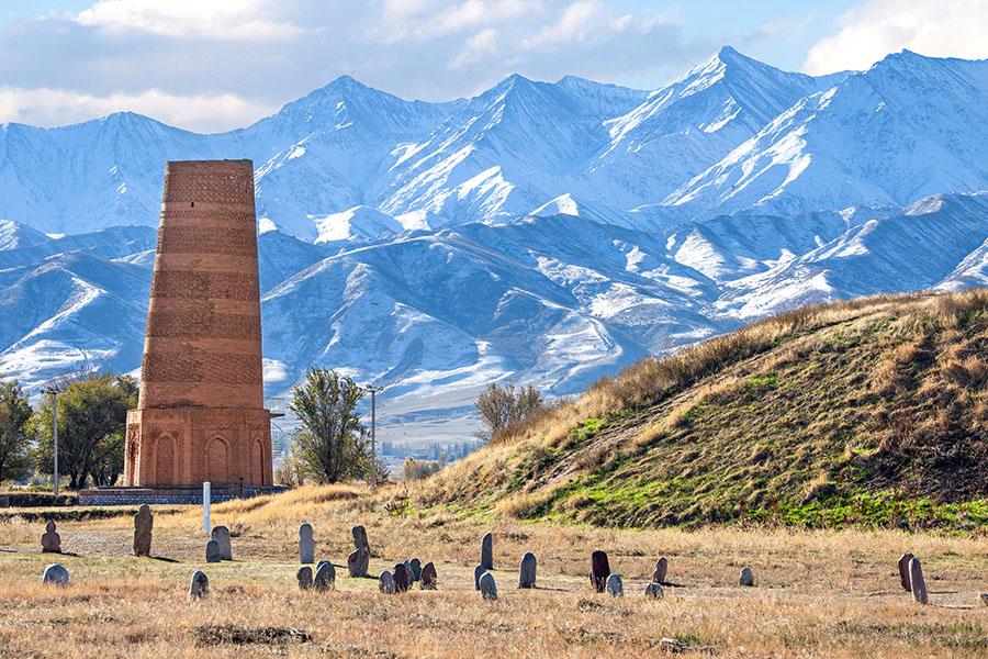 Admire the Burana Tower with the spectacular mountain backdrop | Travel Nation
