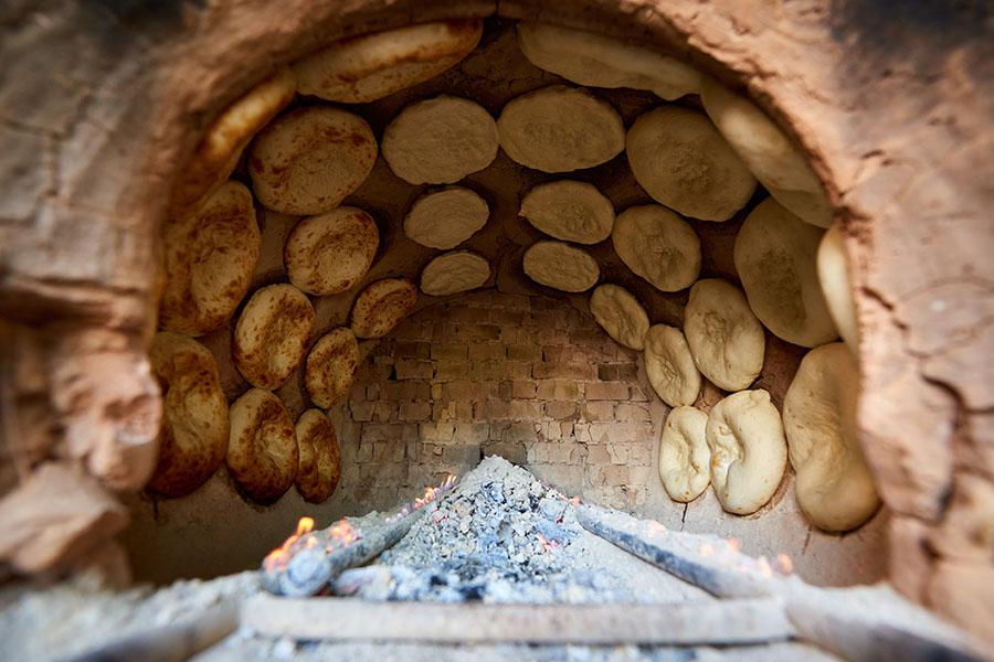 Eat soft bread fresh from the tandoor oven in Kyrgyzstan | Travel Nation