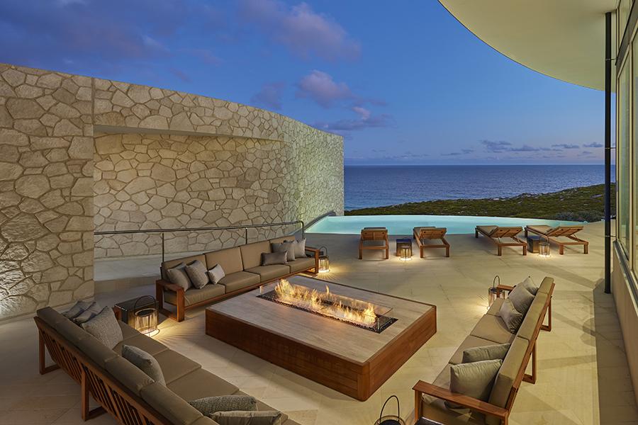 Revel in serene evenings by the outdoor fireplace at Southern Ocean Lodge | Photo credit: George Apostolidis