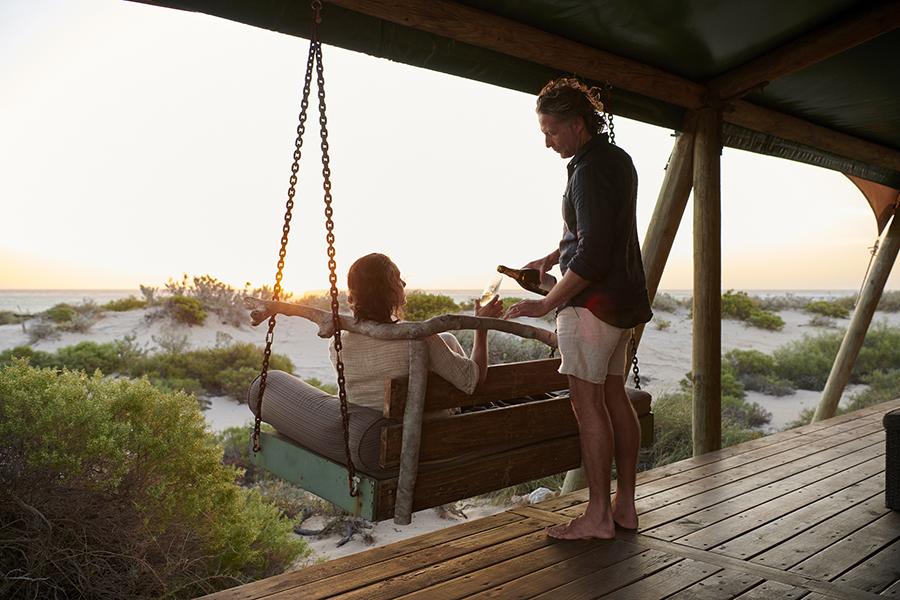 Wake up and enjoy the ocean breeze on your balcony swing at Sal Sails | Photo credit: Sal Salis
