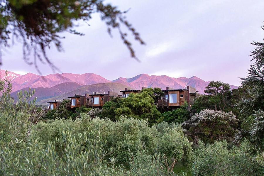 Enjoy quiet moments at Hapuku Lodges as the sun sets behind the mountains | Photo credit: Sal Salis