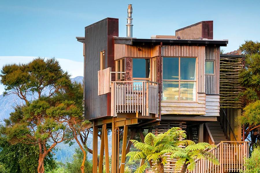 Stay in a charming tree house at Hapuku Lodge | Photo credit: Hapuku Lodge