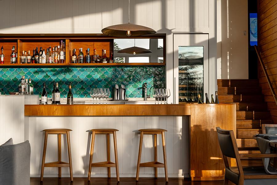 Grab a drink and soak up the lively atmosphere at the Capella Lodge bar | Photo credit: Capella Lodge