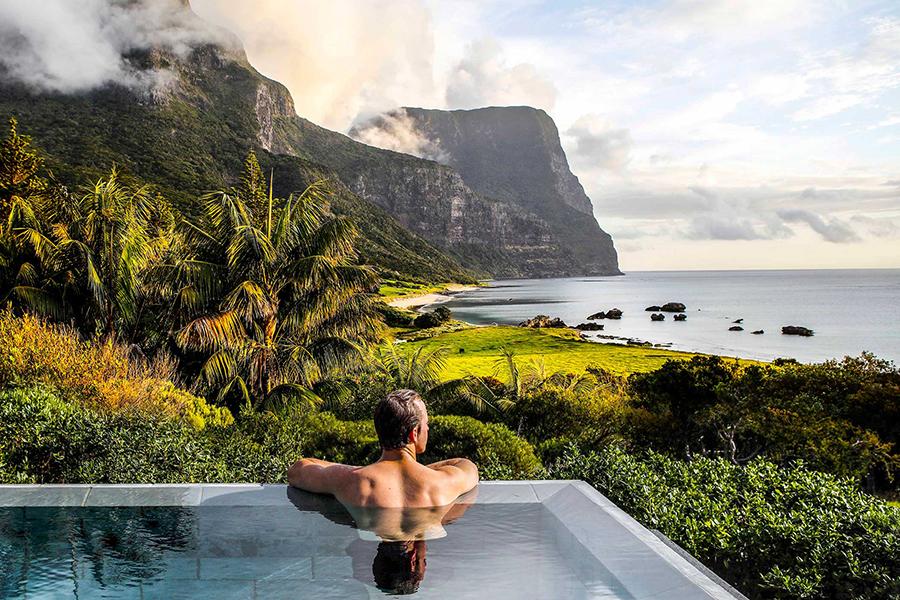 Enjoy golden sunsets and calm evenings with ocean and mountain views from the pool at Capella Lodge | Photo credit: Capella Lodge