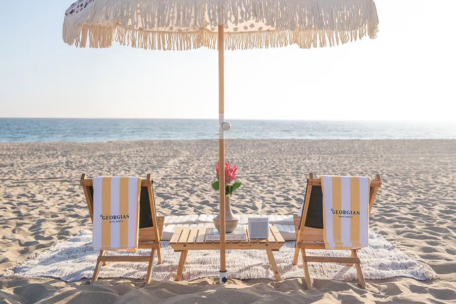 Bask in romance with private beachside lounges for two at The Georgian Hotel | Photo credit: The Georgian Hotel