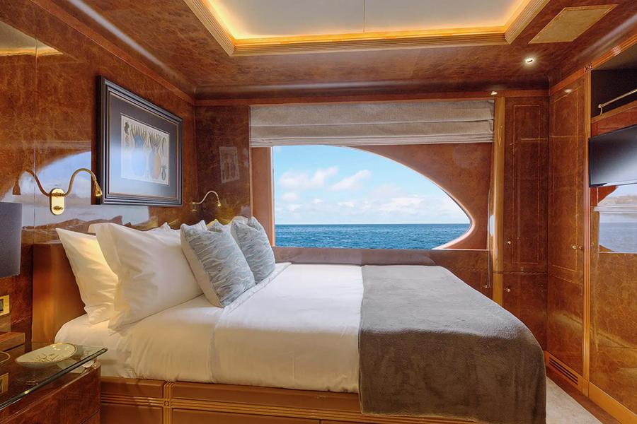 Relax in your luxurious suite on the Aqua Mare in the Galapagos | Photo credit: Aqua Expeditions