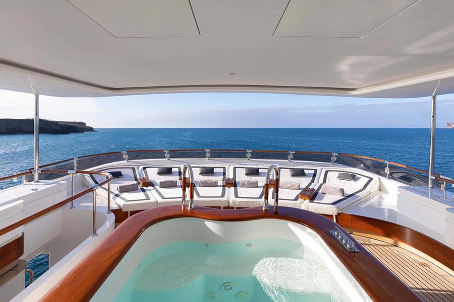 Chill out on deck in the sunshine on the Aqua Mare | Photo credit: Aqua Expeditions