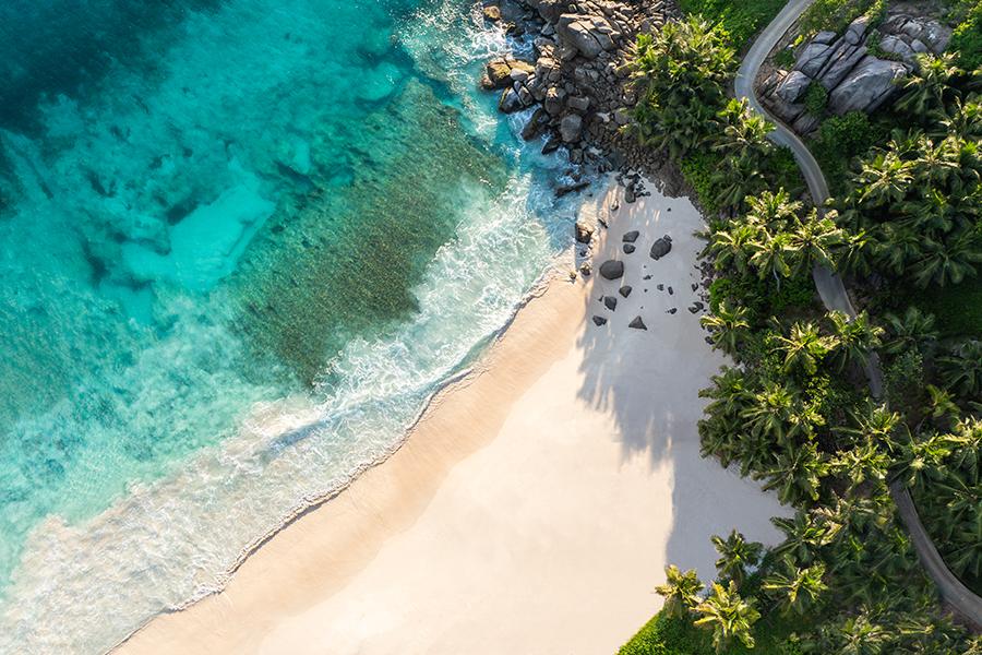 Sink your toes into the sands of Anse Intendance from Cheval Blanc in the Seychelles | Photo credit: Cheval Blanc