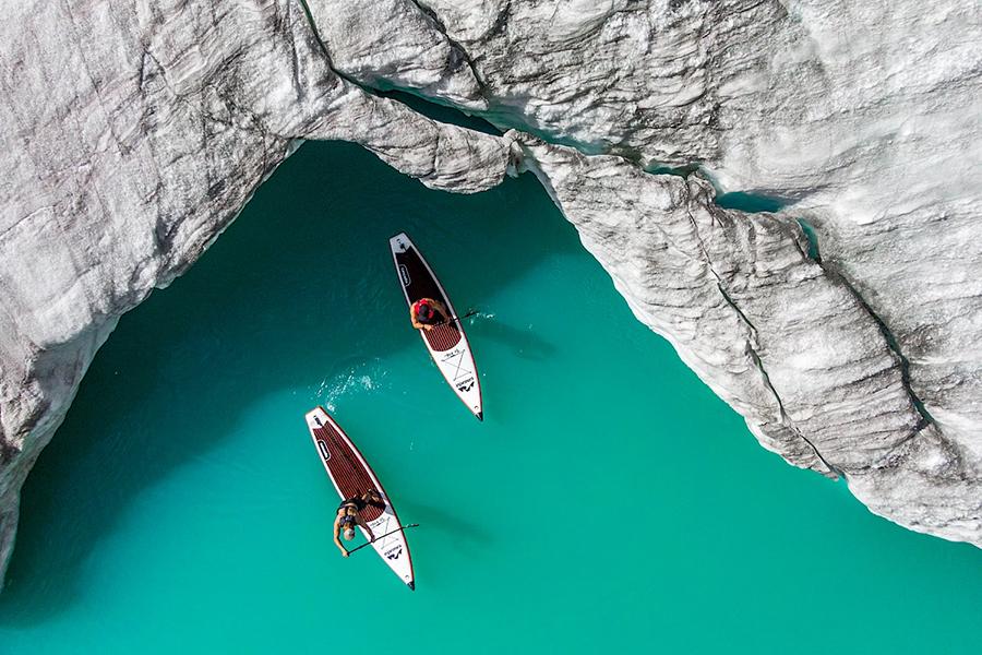 Enjoy stand up paddleboarding in the blue waters around Sonora Resort | Photo credit: Sonora Resort