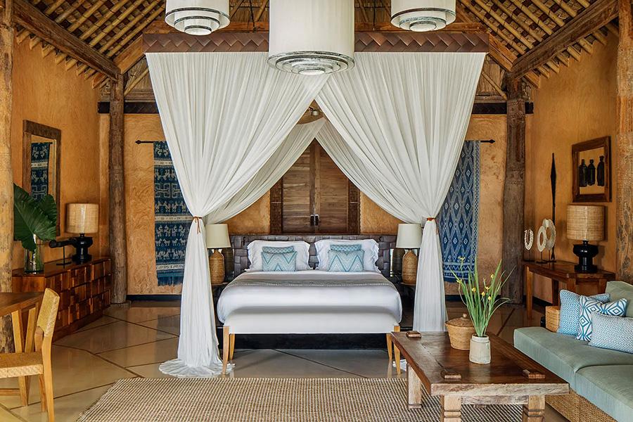 Recharge in your luxury four poster bed in Putri Lantoro Villa at Nihi Sumba | Photo credit: Nihi Sumba
