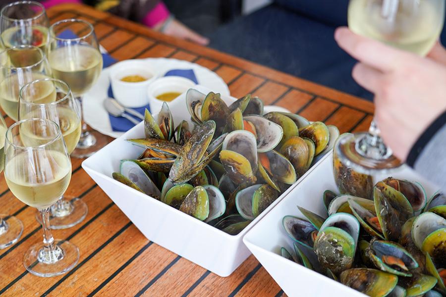 Savour locally caught mussels on board the Seafood Odyssea cruise in New Zealand | Travel Nation