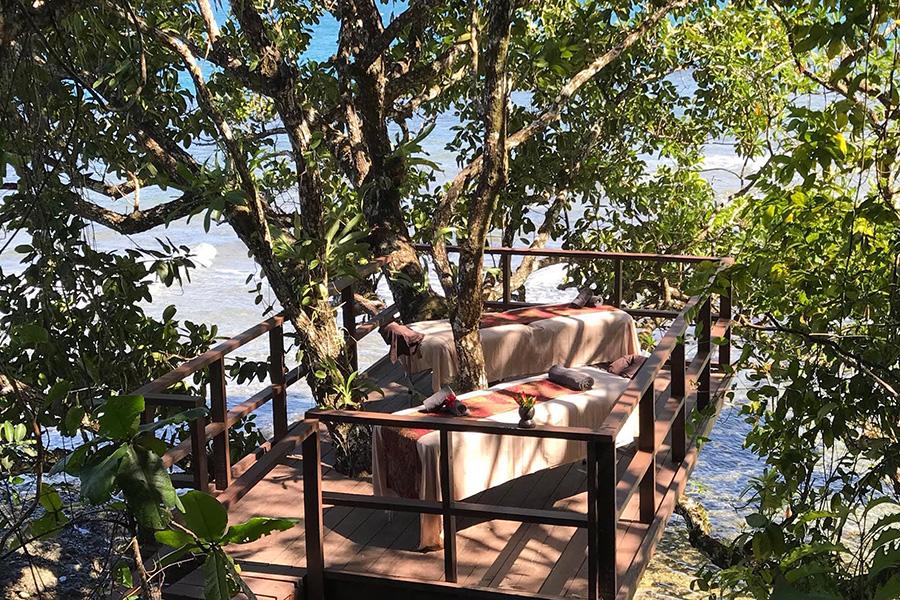 Enjoy a relaxing massage with the sounds of the ocean around you at Nanuku Resort in Fiji | Photo credit: Nanuku Resort