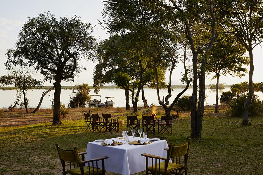 Dine beside the campfire with lake views at Siwandu, Nyerere National Park, Tanzania | Photo credit: LABA LABA