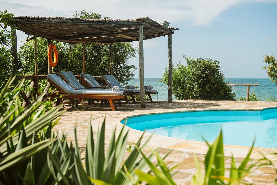 Chill by the pool at Lazy Lagoon Island Lodge | Photo credit: Casey Pratt Foxes Safari Camps