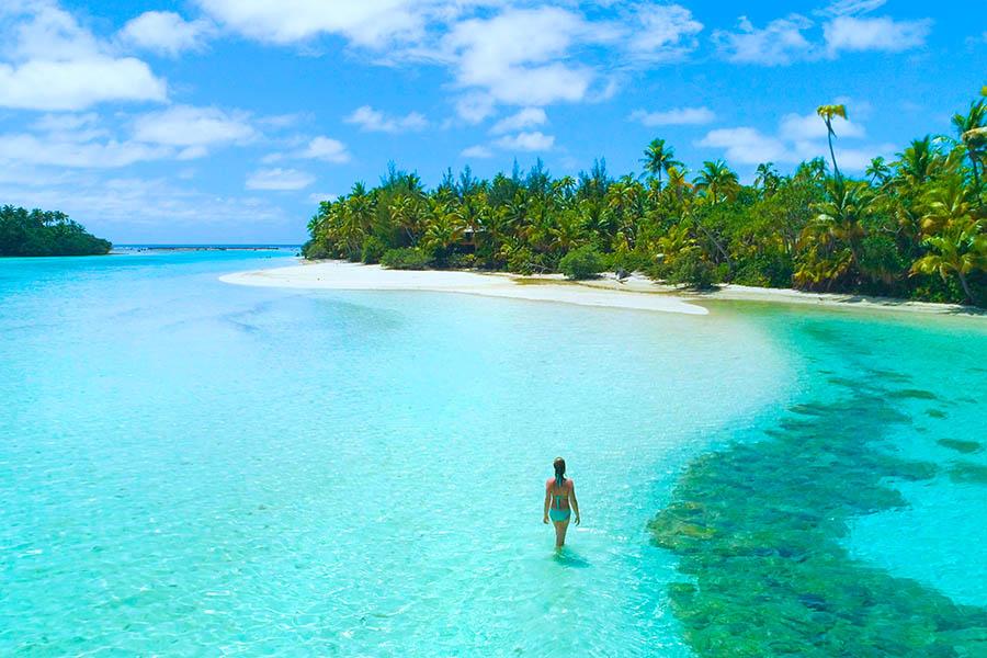 Wade through the bright blue waters surrounding One Foot Island | Travel Nation