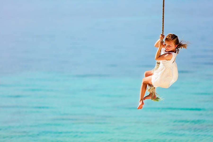 Watch the children play on pure white sands | Travel Nation