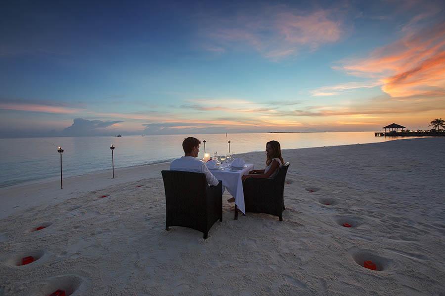 Enjoy a private candlelit dinner on the beach| photo credit: Velassuru Maldives