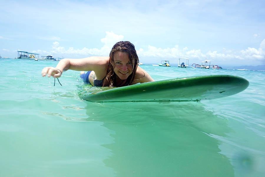 Sara paddling to shore