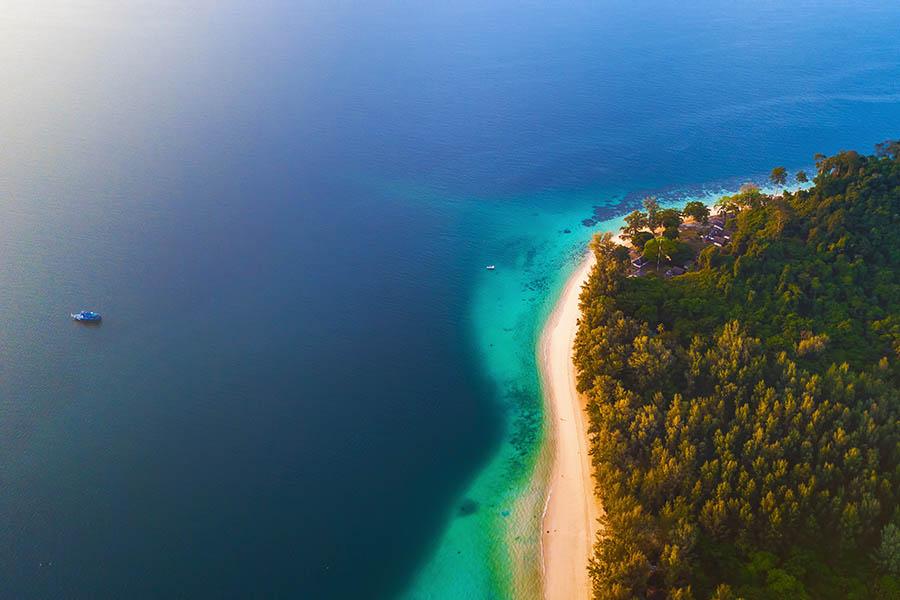 Swim in the clear waters surrounding Koh Kradan, Thailand | Travel Nation